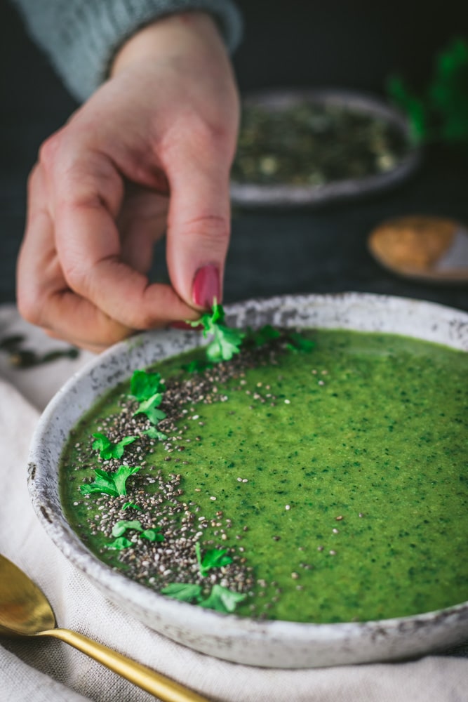 green immune boosting vegan vegetable soup in a bowl