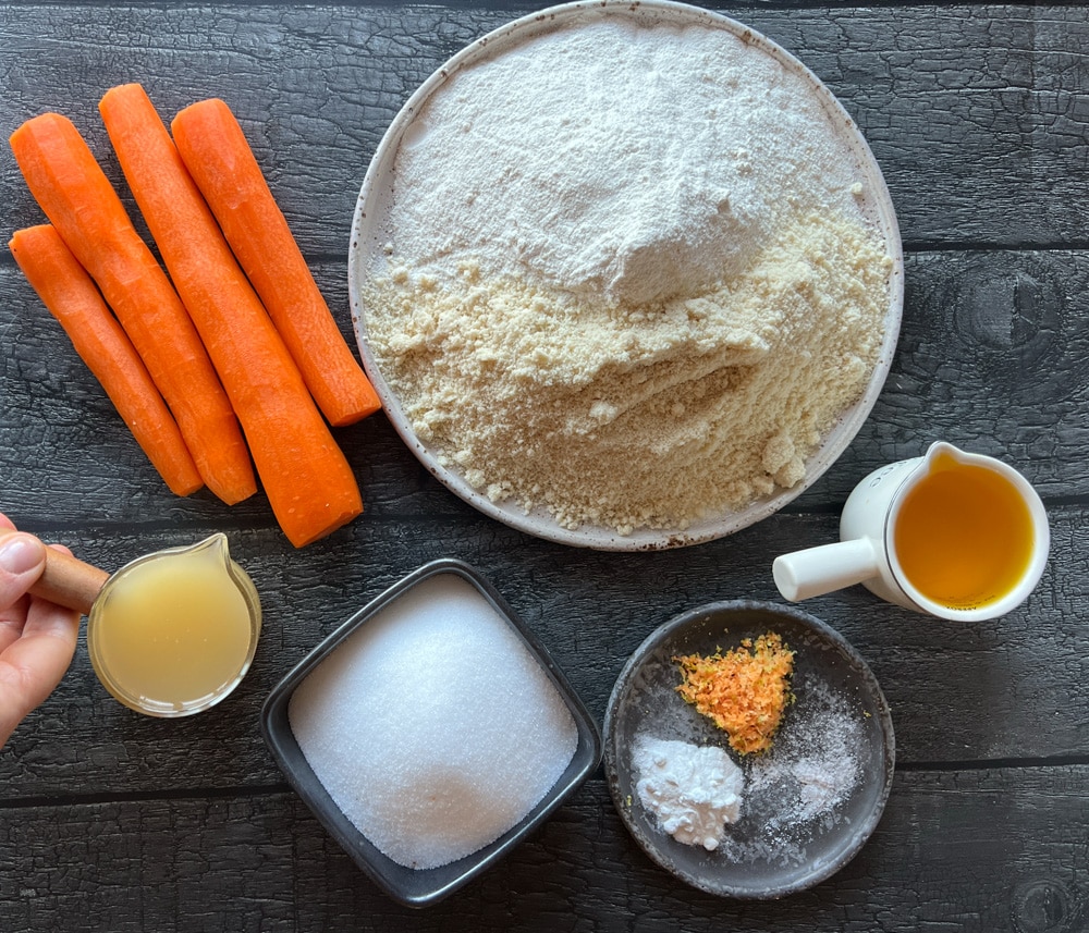 ingredients for Vegan Carrot Bundt Cake with almond crumble – A moist, spiced cake topped with a delicious almond crumble, perfect for any celebration or cozy treat.